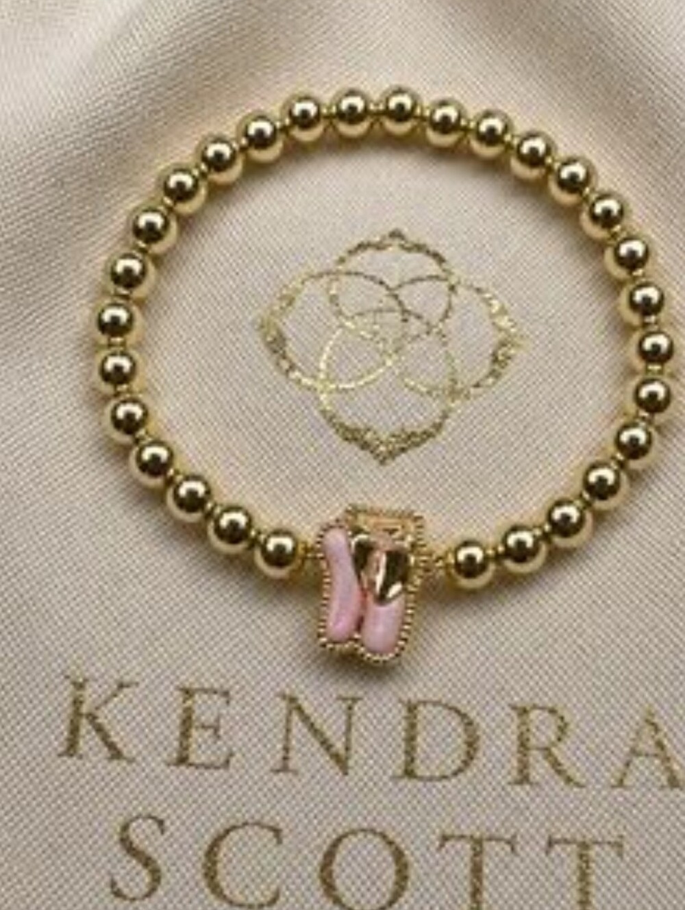 Kendra Scott Gold Beaded Bracelet with Pink Ballet Slipper  Flip-Flop Charm.